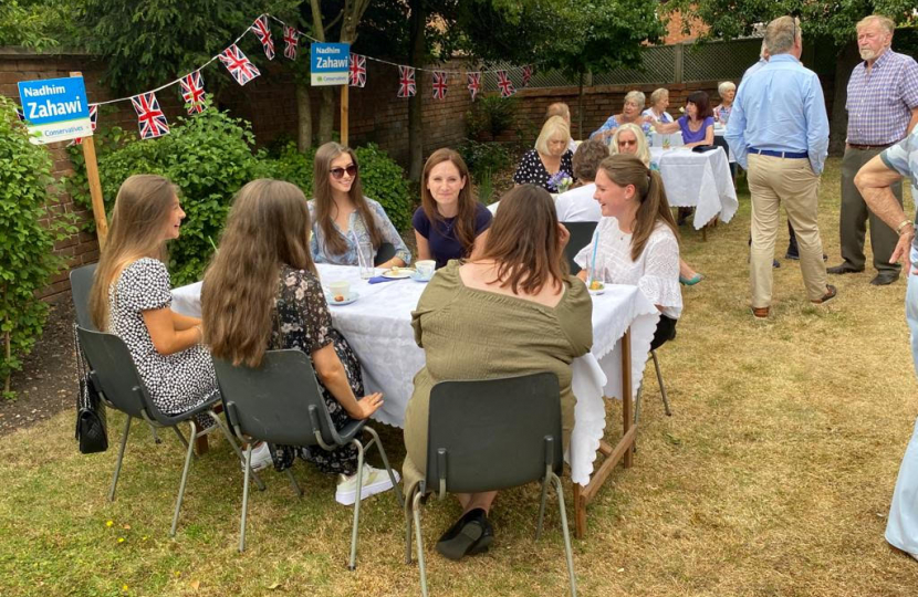 Aphra talking with the young women during the event