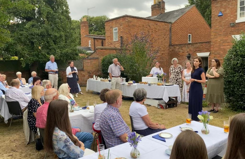 Aphra during her speech in the gardens