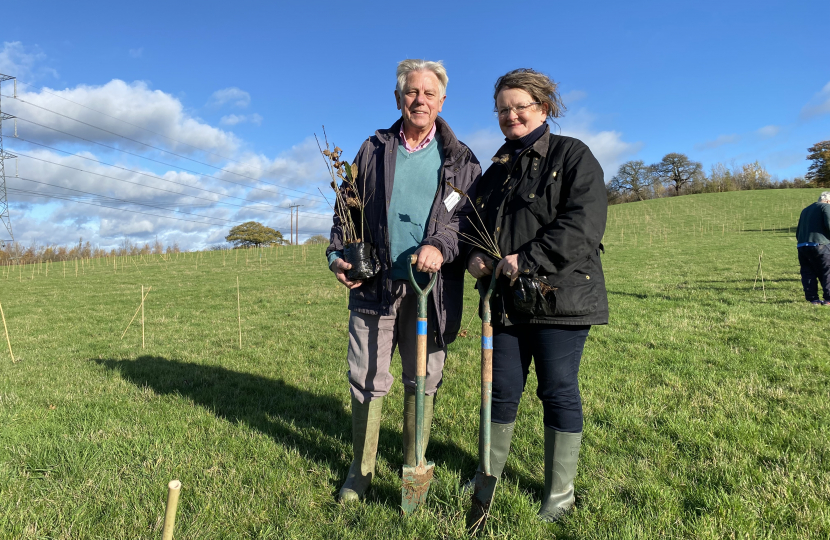 Chris and Sarah planting trees