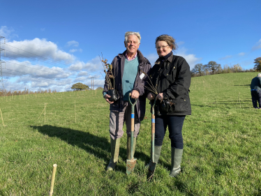 Chris and Sarah planting trees